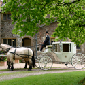 The happy couple arrive in style
